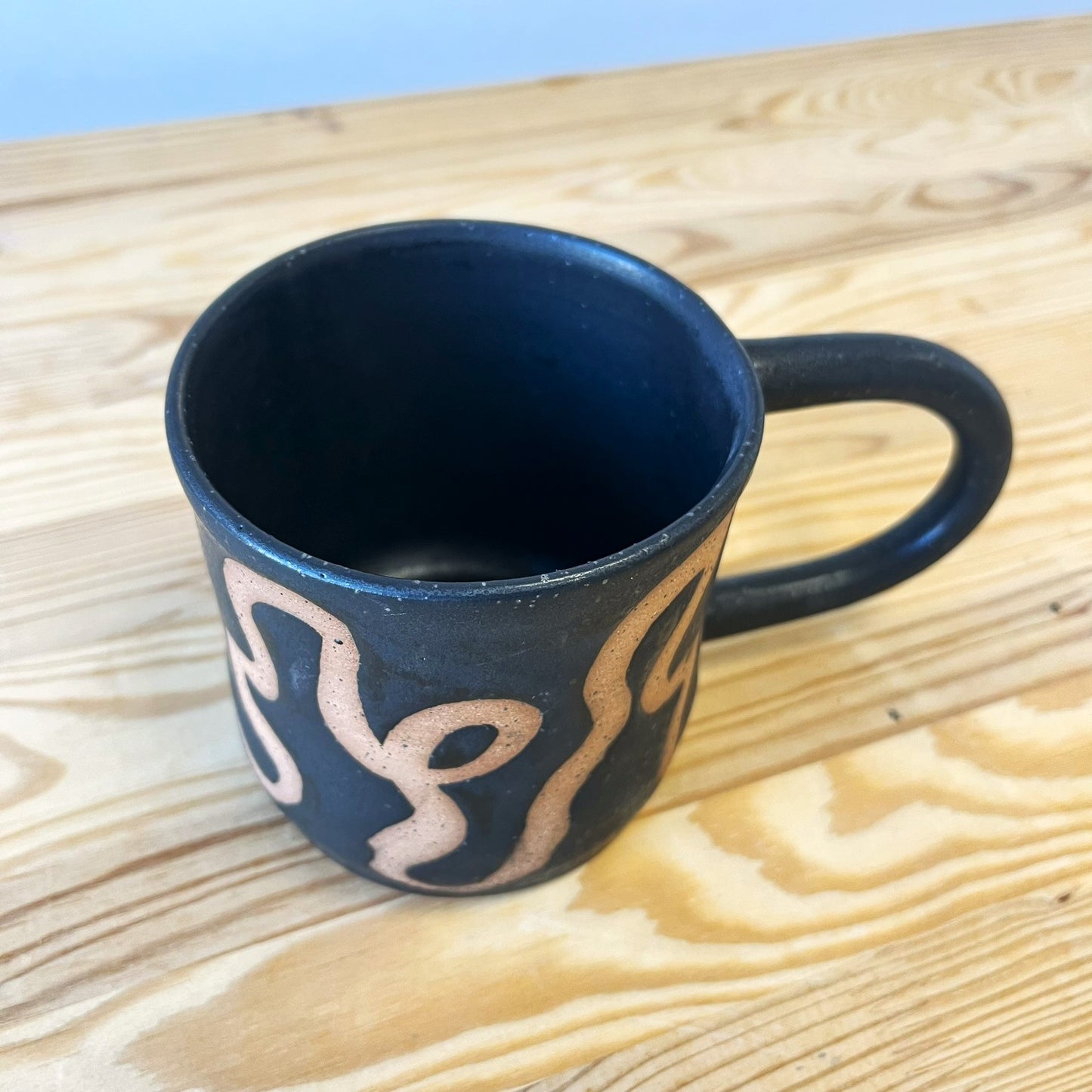 Black Mug with Squiggly Lines