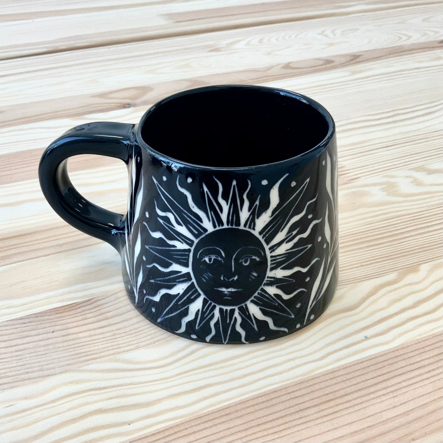 Black Mug with Sun